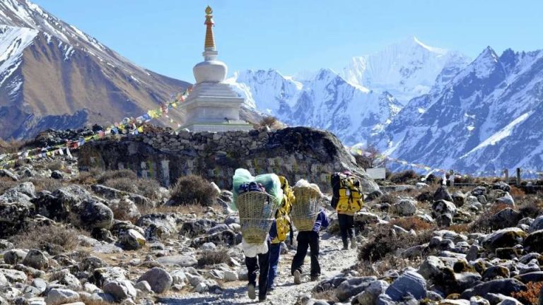 Porters Carrying Bags in Langtang Valley